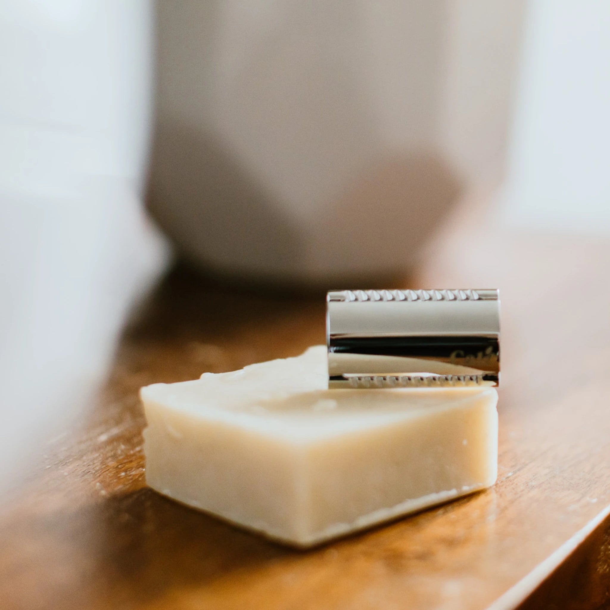 CaliWoods plastic-free silver safety razor resting on natural shave soap – zero waste shaving essentials NZ