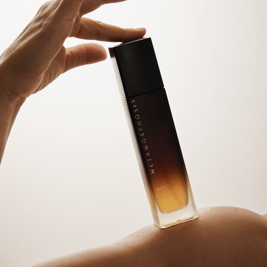 Metamorphosis Awaken Prep Spritz by Vanessa Megan Skincare – 100% natural Hyaluronic Acid facial mist gently held.