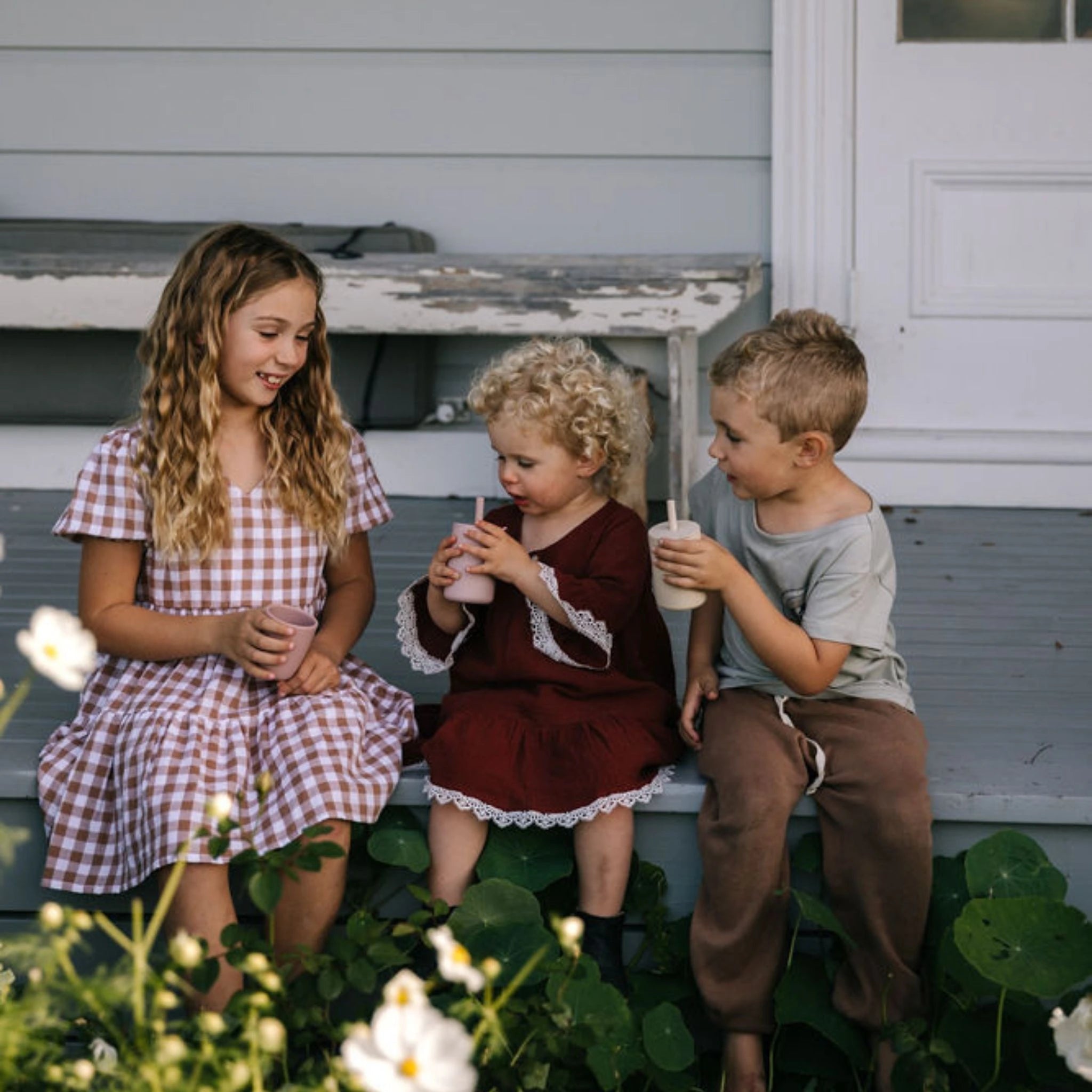 Kids enjoying nutrient-rich smoothies boosted with Norish products. Ideal for the whole family and baby safe form 6 months +