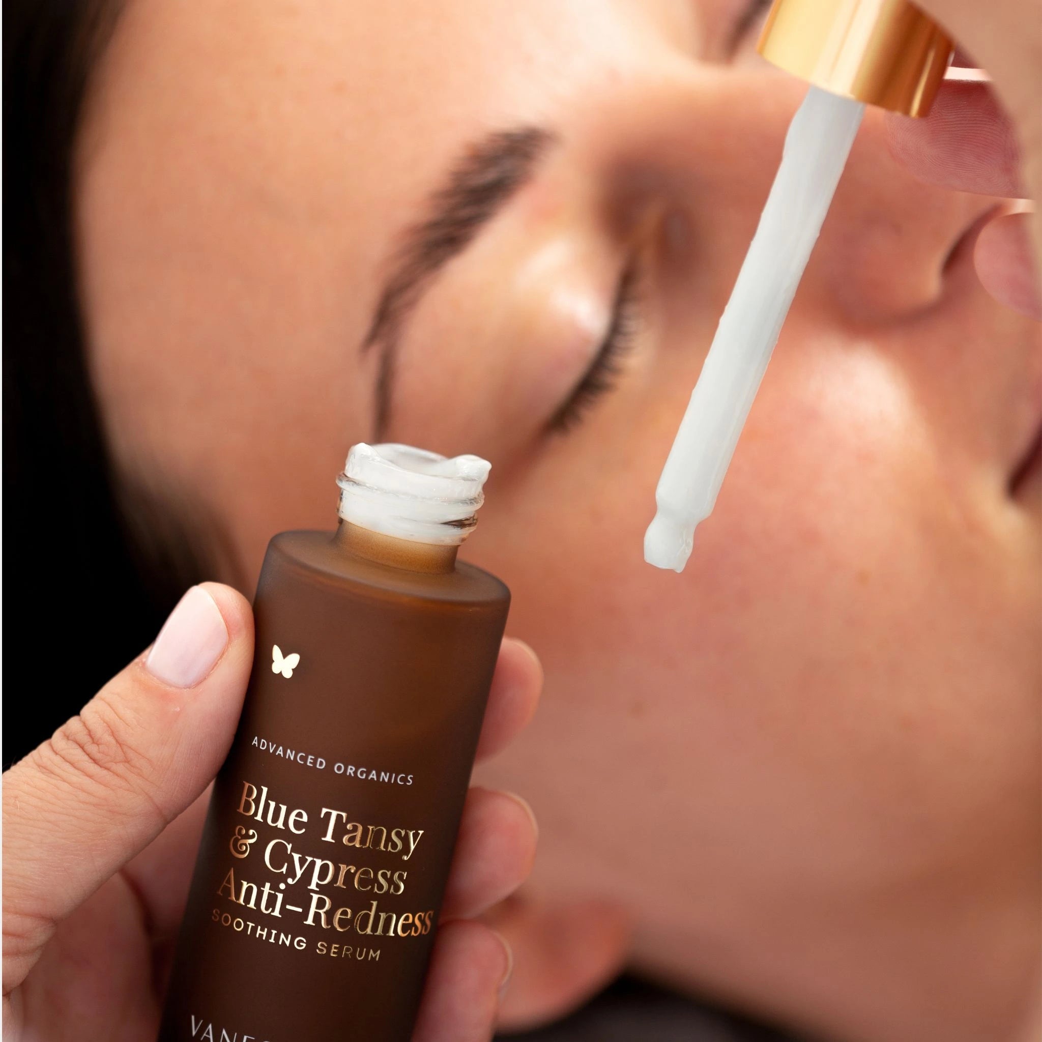 Vanessa Megan Blue Tansy and Cypress Anti-Redness Serum in use — calming milky serum applied directly to skin to soothe redness and support sensitive skin barrier.