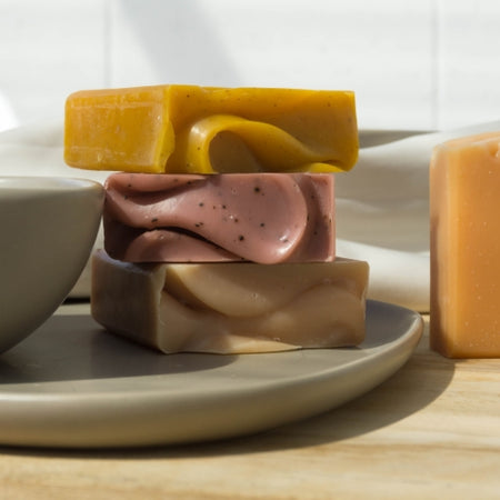 Stack of Fair +Square body wash bars