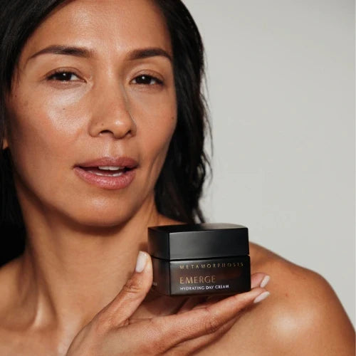 Women holding The Metamorphosis Emerge Face cream for menopausal skin