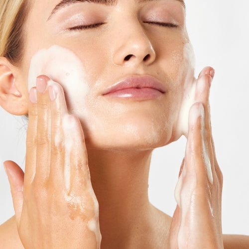 Women cleansing face | oily skincare products