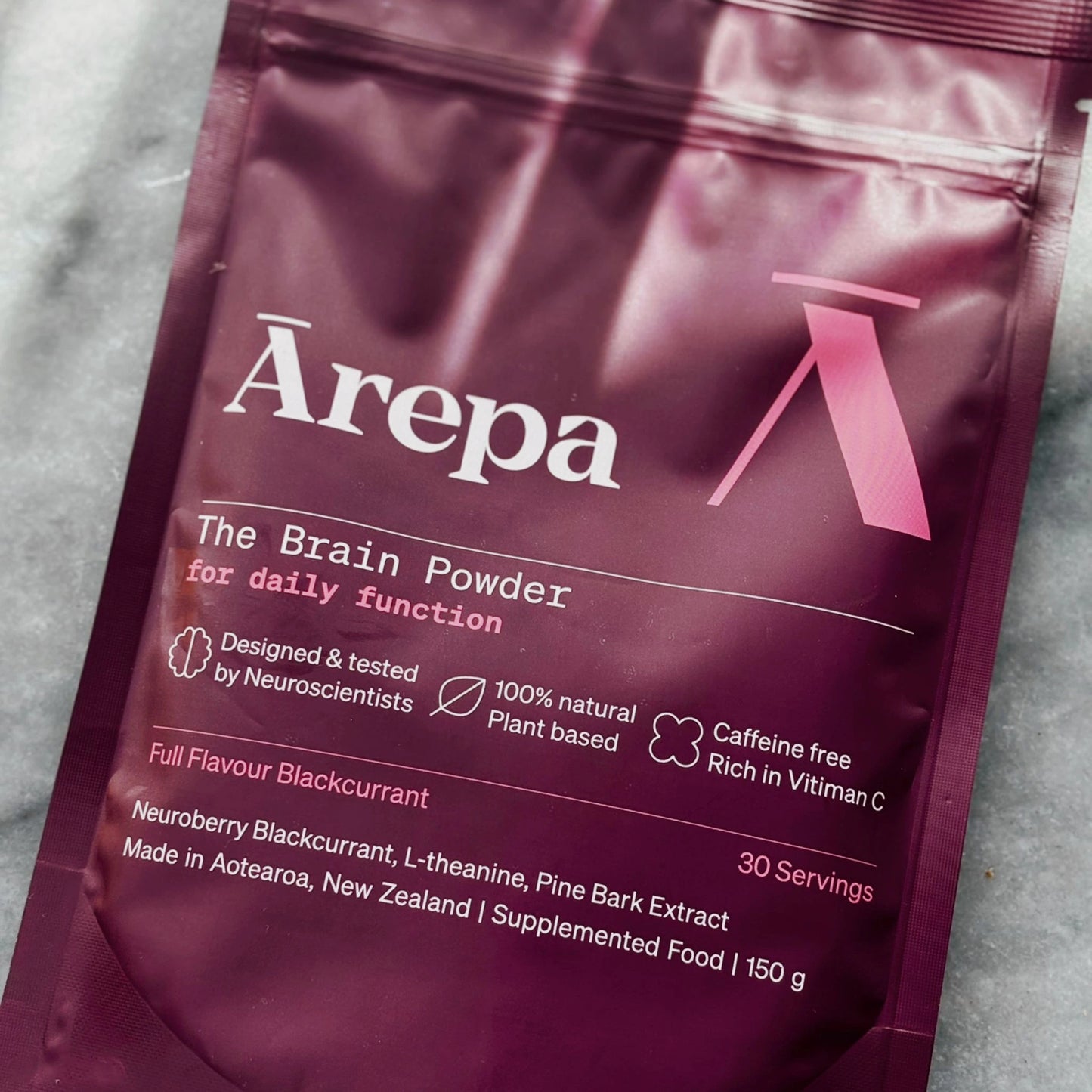 Ārepa Brain Drink Powder pouch in full flavour blackcurrant, featuring 100% natural, caffeine-free, plant-based formulation designed by neuroscientists for daily cognitive support.