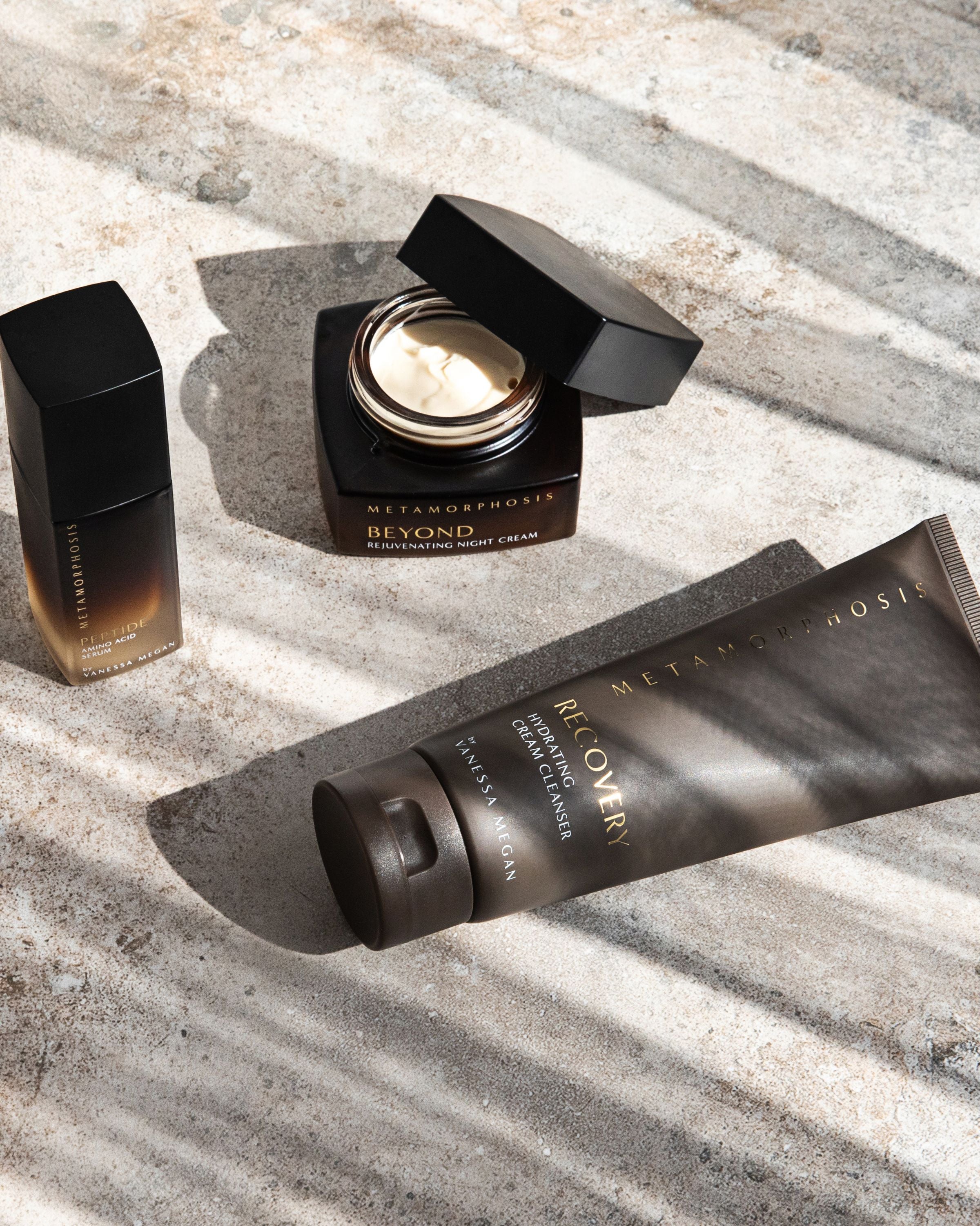 Metamorphosis Skincare by Vanessa Megan collection featuring Peptide Amino Acid Serum, Beyond Rejuvenating Night Cream and Recovery Hydrating Cream Cleanser, designed to support peri to post menopausal skin with hydration, renewal and barrier care.
