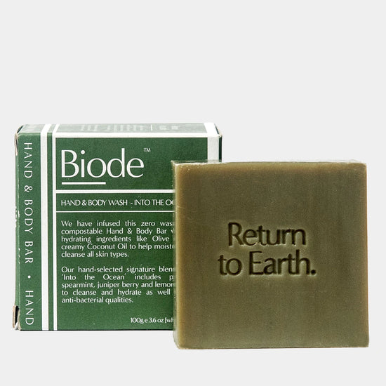 Biode Hand and Body Wash Bar Into the Ocean with green packaging and Return to Earth message embossed in to bar.