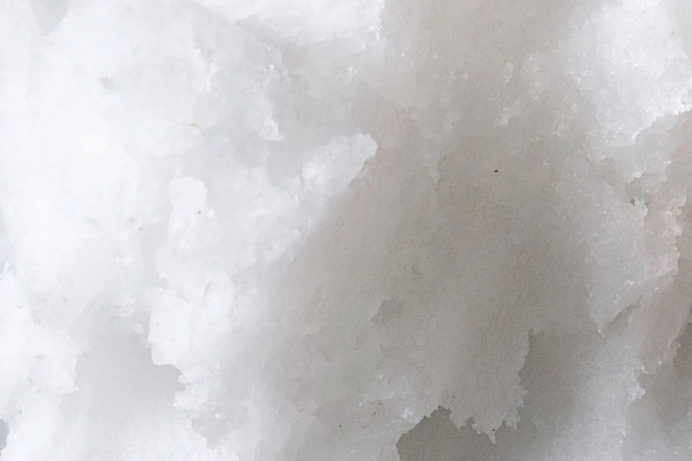 Macro texture of pure coconut oil used in natural skincare beauty and wellness products.