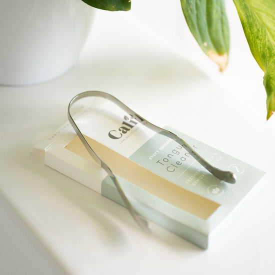 CaliWoods Tongue Cleaner on Its compostable and  recyclable box 