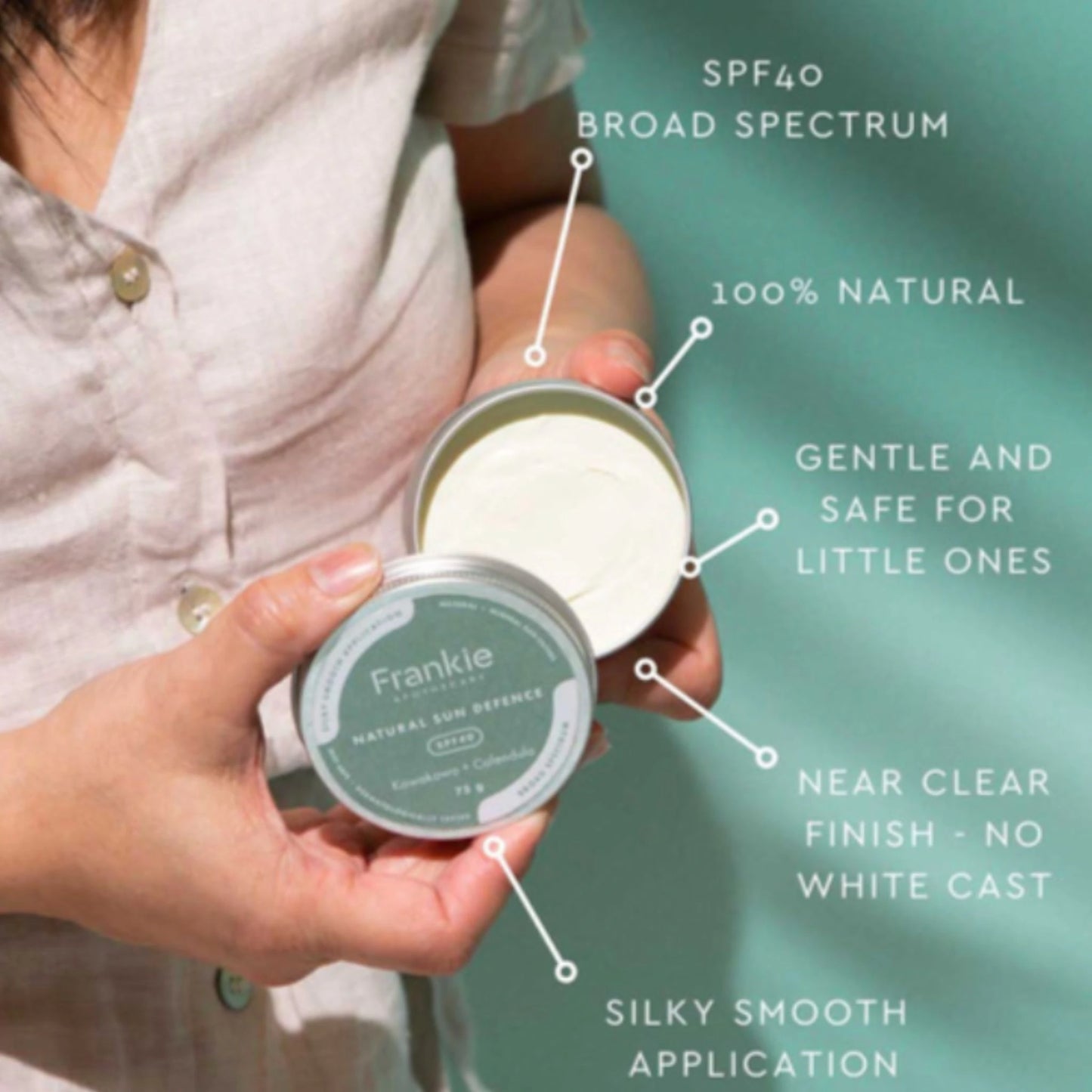 Frankie Natural Sun Defence SPF40 held in hands with open tin showing texture – 100% natural, broad-spectrum SPF for sensitive skin and kids, with no white cast.