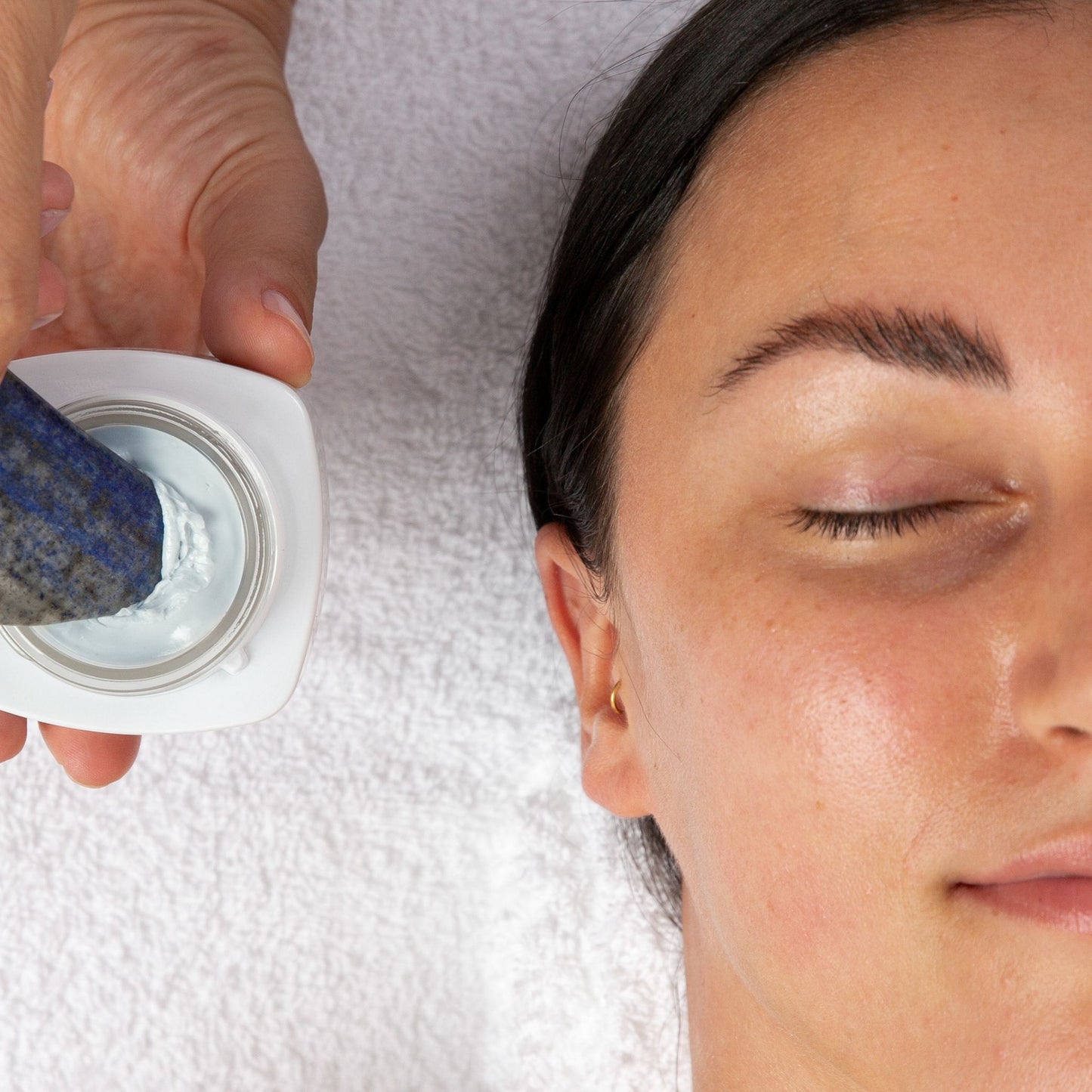 Vanessa Megan AEON Azure Regenerative Cream used with gua sha tool during facial treatment.