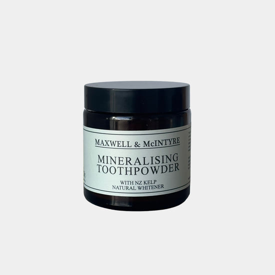 Maxwell & McIntyre Natural Organic Mineralising Toothpowder with NZ kelp natural whitening formula in amber glass jar.