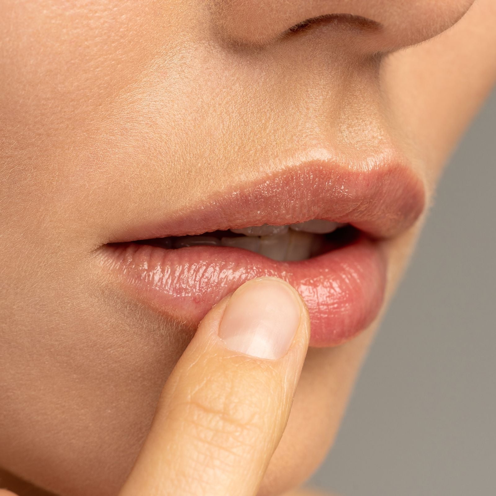 Close up of smooth healthy lips reflecting gentle low abrasion oral care.