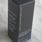 Side view of Cool & Calm Mist product box with gold foil 'Key Benefits' text outlining menopausal hot flush relief and hormone-balancing support.