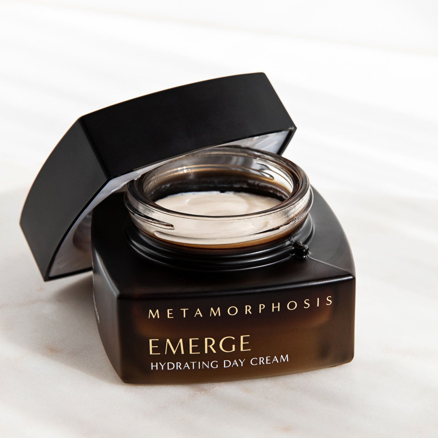 Open jar of Metamorphosis Emerge Hydrating Day Cream by Vanessa Megan – nourishing natural day cream for hydrating and protecting peri to post-menopausal skin.