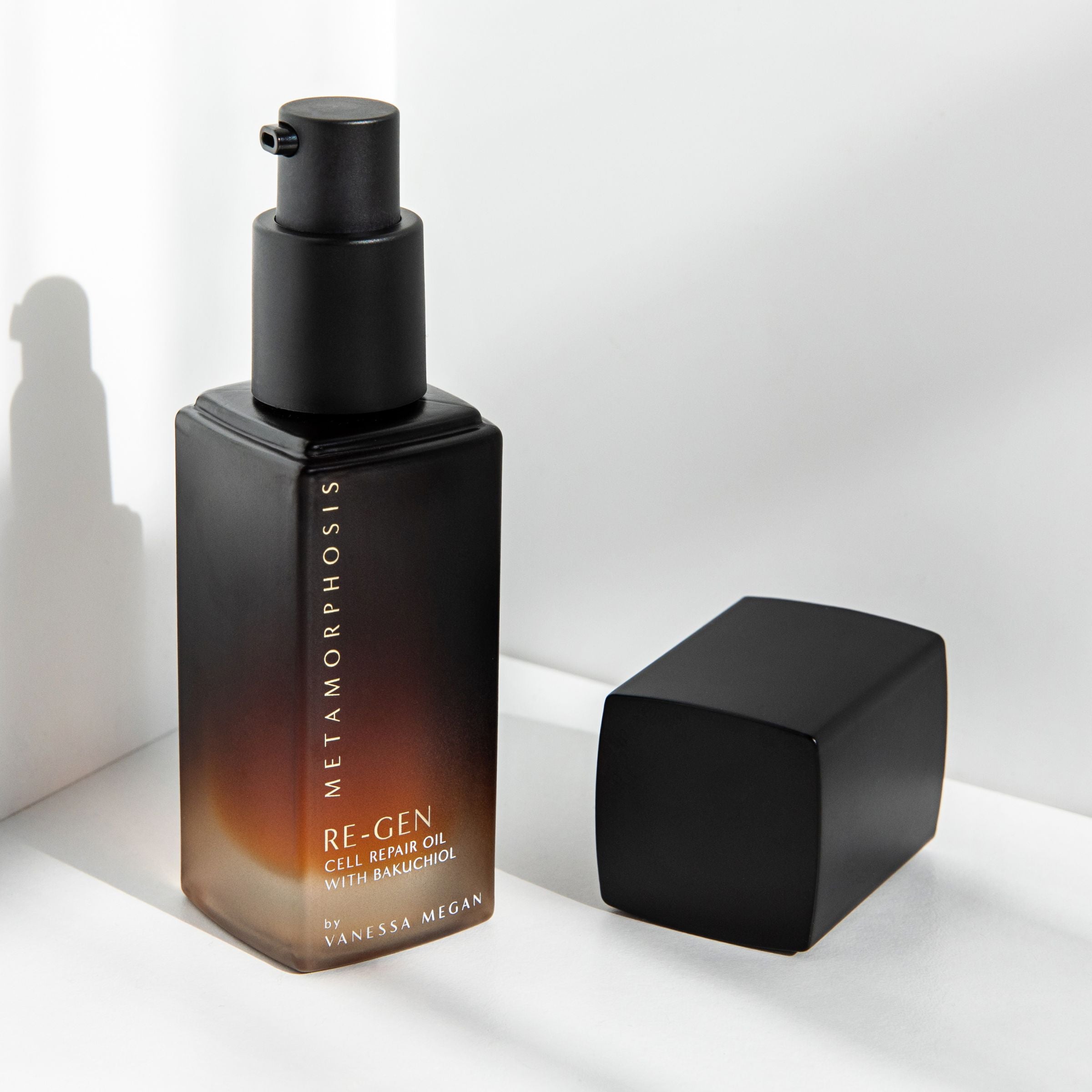 Metamorphosis Re-Gen Cell Repair Oil with Bakuchiol, cap off, showing premium pump dispenser.