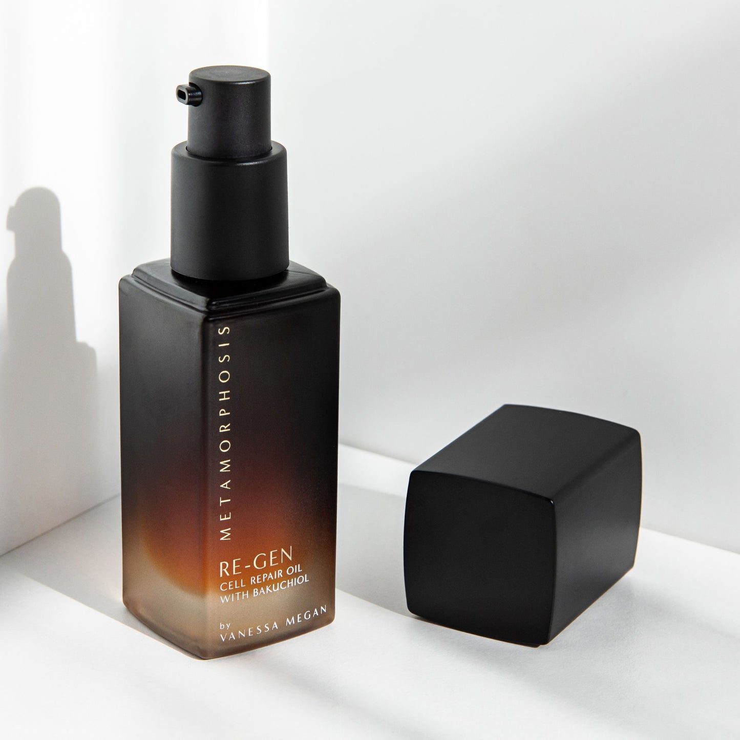 Metamorphosis Re-Gen Cell Repair Oil with Bakuchiol, cap off, showing premium pump dispenser.