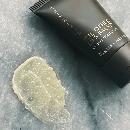 Metamorphosis The Other Lips Balm textural image with product packaging