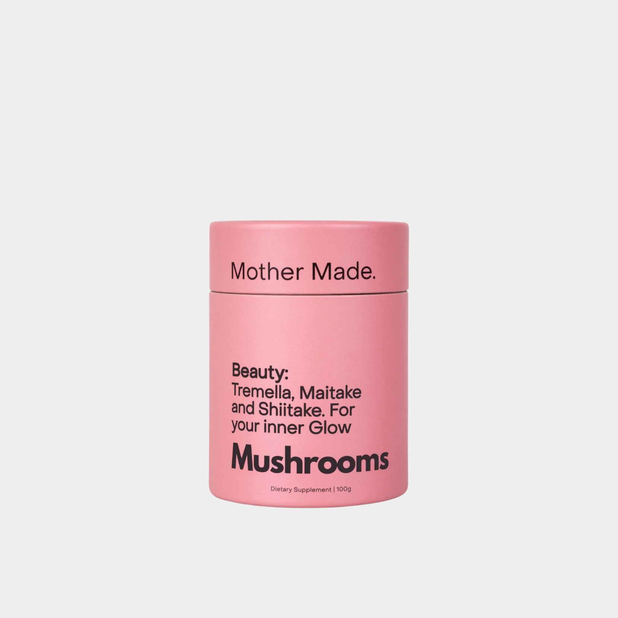 A pink cylindrical container of Mother Made. Beauty: Tremella, Maitake and Shiitake Powder.