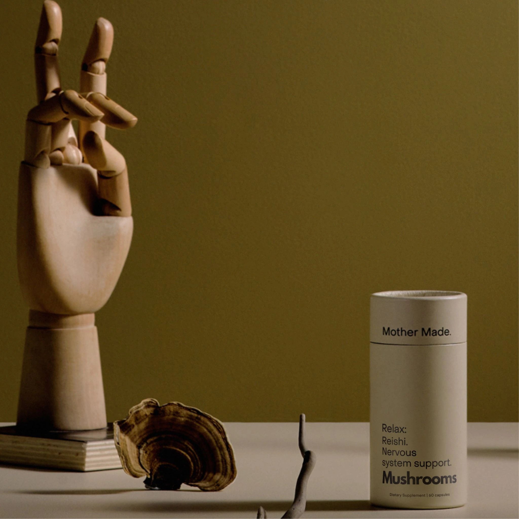 Mother Made Relax Reishi Capsules for nervous system support in minimalist packaging with calming scene