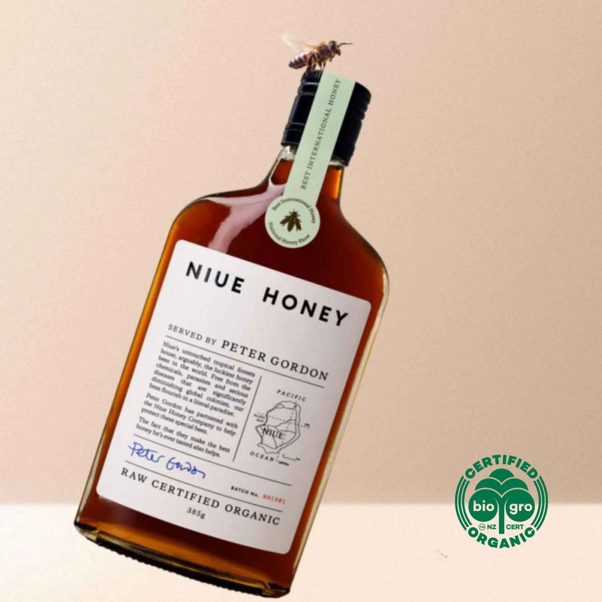 Niue Honey raw certified organic honey bottle with bee and BioGro NZ organic certification badge