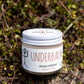  No3 Underbalm Vanilla and Lime natural deodorant jar photographed outdoors on native greenery.