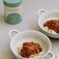 Two bowls of spaghetti with rich, nourishing sauce boosted with Norish NutriDense Meal Booster,