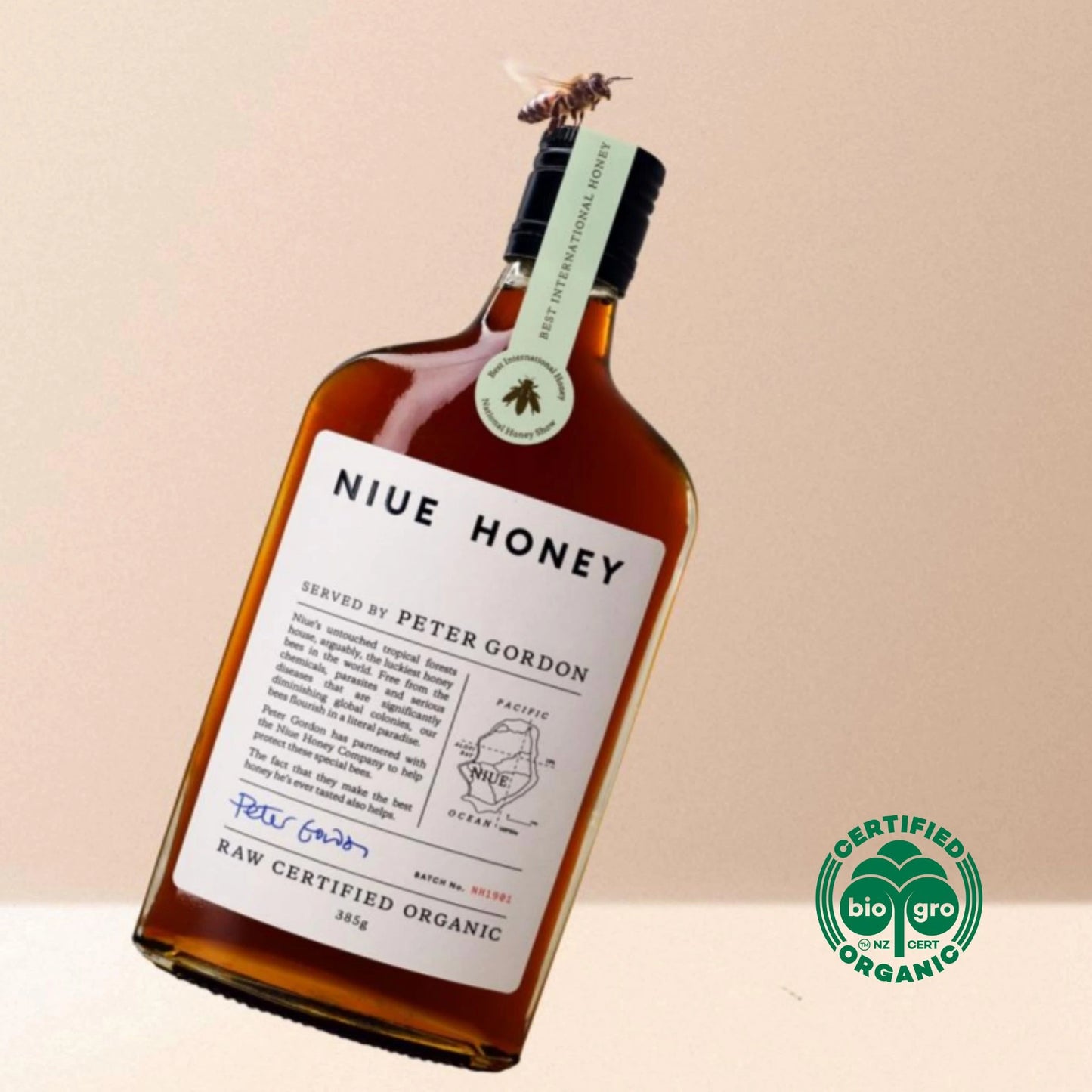 Niue Honey raw certified organic honey bottle with bee and BioGro NZ organic certification badge