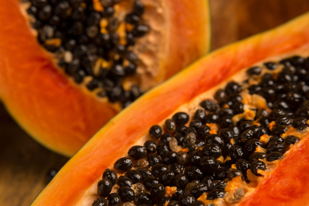 Fresh papaya fruit rich in natural enzymes, a skin-renewing ingredient used in beauty, skincare and wellness formulations.