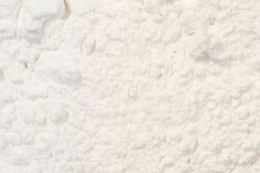 Oryza Sativa (Rice) Flour with its dual role as a nutritious health food and a gentle botanical exfoliant that smooths skin texture, enhances radiance and supports clarity with antioxidant protection while preserving the skin barrier.