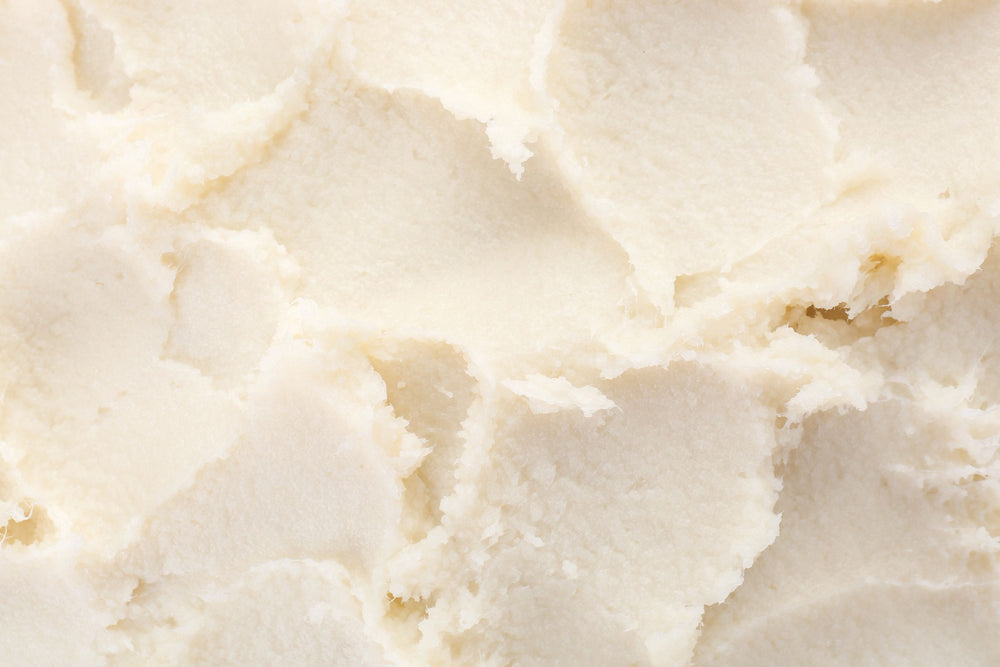 Creamy, whipped shea butter texture highlighting its rich consistency and nourishing benefits for dry, dehydrated, traumatised and mature skin.