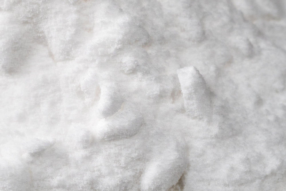 Close up of sodium bicarbonate mineral powder used in natural beauty health and oral care products.