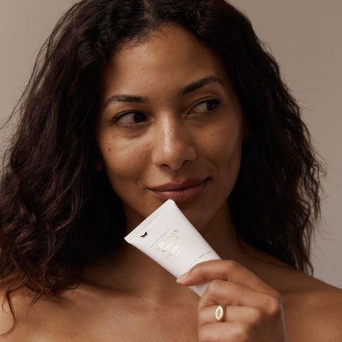 Women holding the Vanessa Megan Vanessa Megan Intensive Dermal Repair Moisture Balm