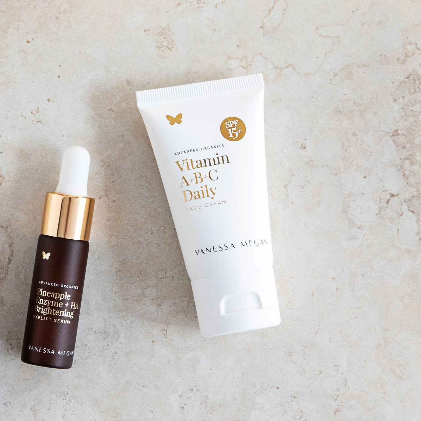 Vanessa Megan Vitamin A+B+C Daily Face Cream with SPF15 and Pineapple Enzyme + HA Brightening Eye Lift Serum – organic skincare duo with natural sun protection and anti-ageing actives in eco sugarcane and glass packaging.