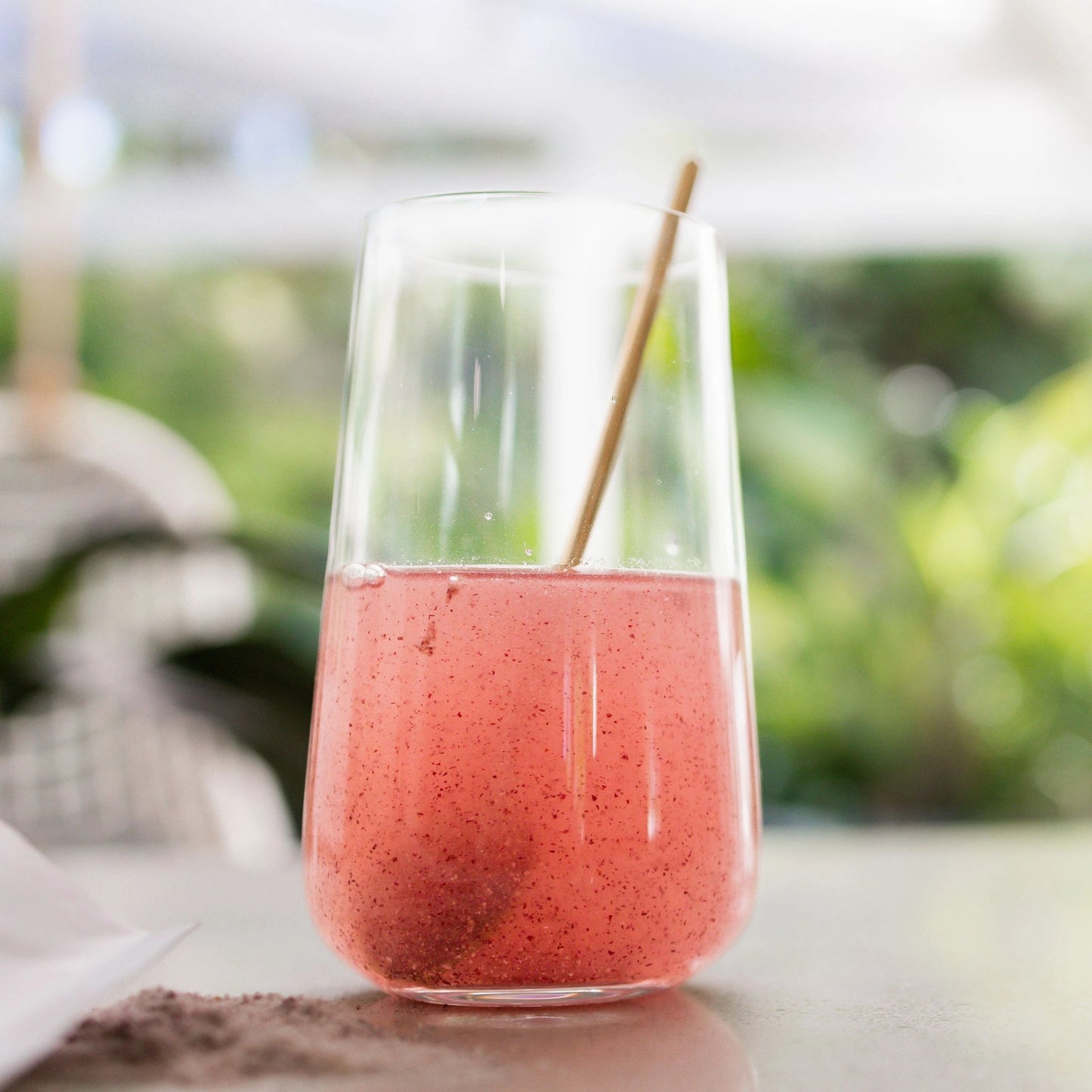 Prepared Vanessa Megan Astaxanthin and Marine Collagen Skin Boost drink with vibrant pink color, collagen peptides & natural antioxidants supporting youthful skin, joint health & hair vitality.