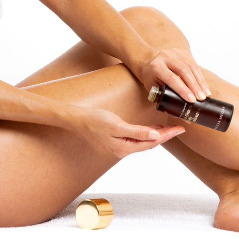 Vanessa Megan  Organic Body Oil being massaged into legs, supporting skin elasticity and visible tone improvement.