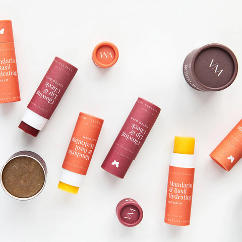 Vanessa Megan lip care collection featuring natural Mandarin & Basil Hydrating Lip Balm, Glowing Lip & Cheek Tinted Balm, and Brown Sugar Lip Scrub in sustainable packaging