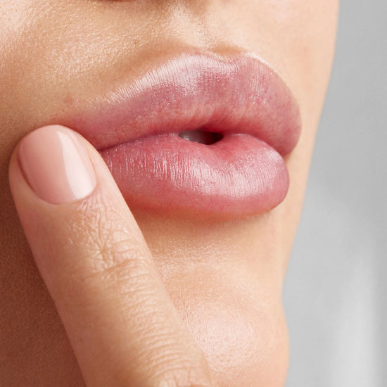 Close up of the Vanessa Megan Mandarin and Basil Hydrating Lip Balm applied to lips, natural organic lip treatment for deep hydration, nourishment and soft healthy looking lips.