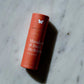 Vanessa Megan  Lip Balm in its home compostable eco-friendly tub package.
