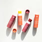 Vanessa Megan lip balm range featuring Mandarin & Basil Hydrating Lip Balm and Glowing Lip & Cheek Tinted Balm, natural multi-use beauty in compostable packaging.