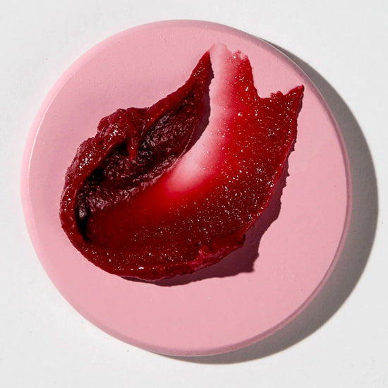 Rich berry-red swatch of Vanessa Megan Glowing Lip & Cheek Tinted Balm showcasing its Rich berry-red creamy, buildable pigment from 100% natural, organic ingredients."