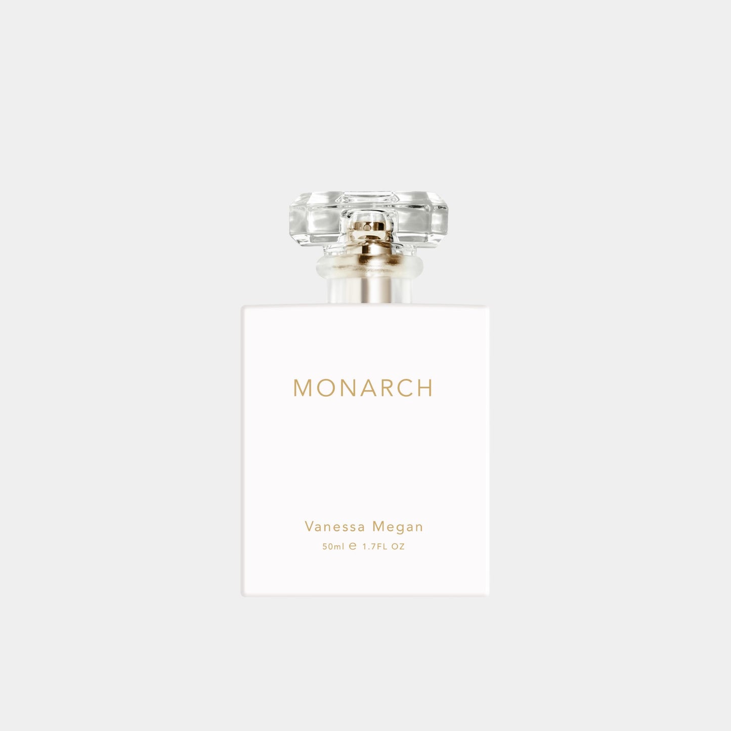 Vanessa Megan Monarch Natural Perfume  50ml white bottle with a faceted clear cap and gold detailing.