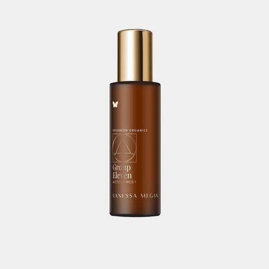 Vanessa Megan Group Eleven Active Mist hydrating facial toner in amber glass bottle with gold spray cap.