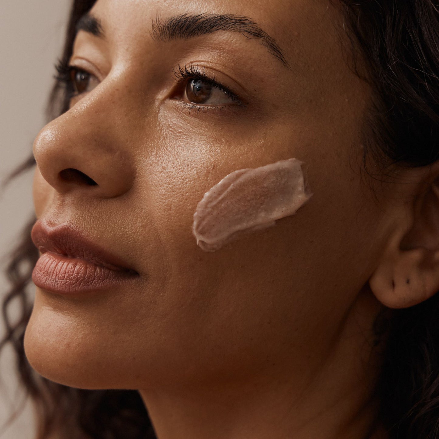 Close up of Vanessa Megan Hibiscus and Banksia Mattifying Cream Clay Face Mask texture applied to skin.