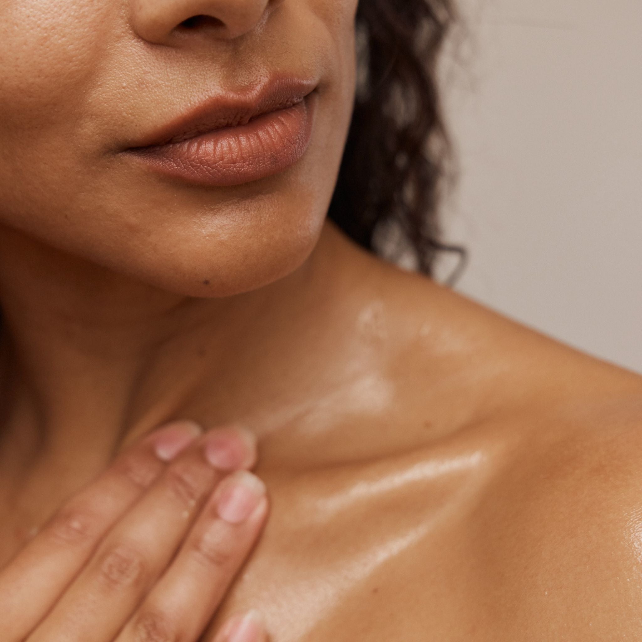 Vanessa Megan Intensive Dermal Repair Moisture Balm close up application to face and décolletage.
