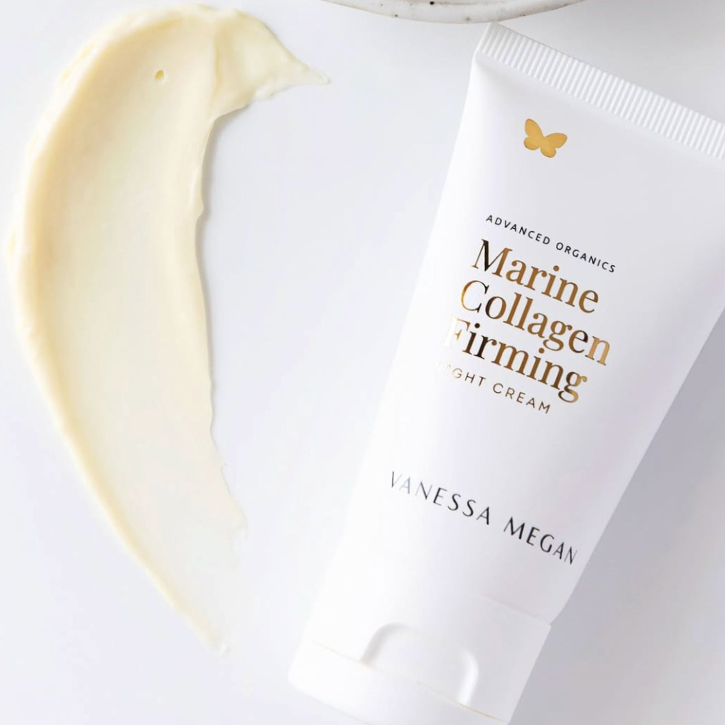 Vanessa Megan Marine Collagen Firming Night Cream in recyclable sugarcane tube with cream texture swatch.