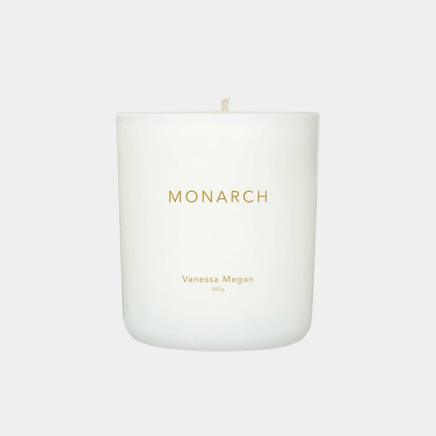 Vanessa Megan Monarch 100% Natural Soy Wax Candle in white glass jar with cotton wick.