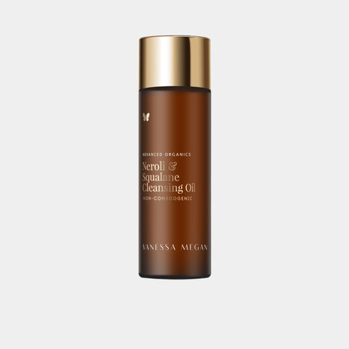 Vanessa Megan Neroli and Squalane Cleansing Oil in amber glass bottle with gold cap.