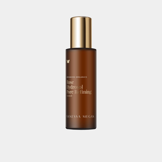 Vanessa Megan Rose Hydrosol Pore Refining Toner. A certified organic pure Bulgarian Rose hydrrsol in a amber 100ml glass atomiser bottle with gold cap.
