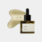 ver Kansa metal Gau Sha skincare tool with face oil bottle
