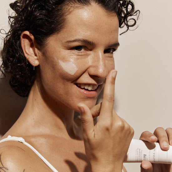 Vanessa Megan SPF 50 Mineral Sunscreen application on face, natural zinc sunscreen cream with broad spectrum protection, clean organic sun care NZ.